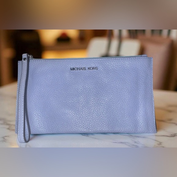 Michael Kors Handbags - Michael Kors light blue/gray wristlet 💙